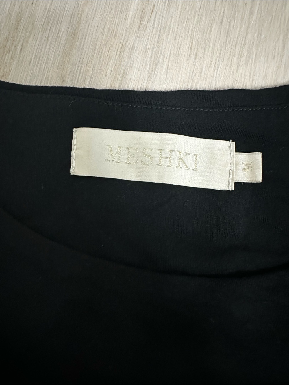 Meshki Black Long-Sleeve Cropped Top with Contrast Stitching - Picture 2 of 3